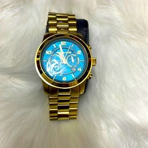 Michael kors gold watch with blue face